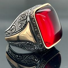 Silver Natural Ruby Stone Ring , Man Handmade Silver Ring , Red Stone Ring,  Engraved Silver Ring , Ottoman Style Ring ,925k Sterling Silver ★Item Details * Gender : Male / Female * Material : 925K Sterling Silver * Total weight : 16 Grams * Gemstone : Ruby  Stone ✔ Ready to Ship in 1-2 Business Days .. ✔ Shipped to the Worldwide 1-5 business days with free shipping... ✔ The product will be sent to you with a handmade wooden box to avoid any damage during shipping... ✔ Visit our store, browse ot Collectible Red Jewelry With Polished Finish, Red Polished Finish Collectible Jewelry, Red Engraved Signet Ring For Formal Occasion, Formal Red Engraved Signet Ring, Collectible Oval Red Ring, Oval Red Signet Ring Collectible, Red Oval Signet Ring Collectible, Formal Red Engraved Ring With Polished Finish, Classic Red Jewelry Ring