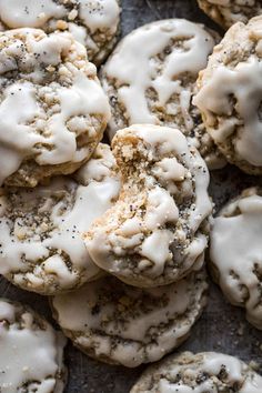 cookies with white icing and sprinkles on top