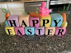 colorful blocks spelling happy easter on a kitchen counter