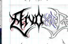 some type of lettering that is drawn on paper