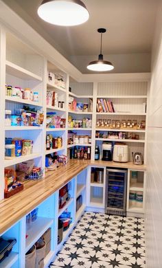 a kitchen with lots of shelves filled with food