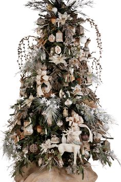 a christmas tree decorated with ornaments and deer figurines is shown in front of a white background