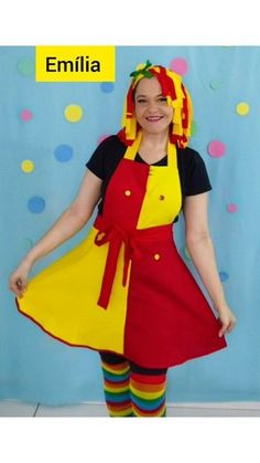 a woman wearing an apron and striped tights is standing in front of a blue backdrop