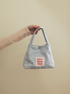 love slow stay makes products using eco-friendly leather and fabric, it focuses on making products that are not limited by rapidly changing trends.- Soft denim used mini tote bag- Lovely and rough heart pattern point- Brand's logo patch on the front- Compact size to carry around easily Small Casual Bag For Everyday Use, Casual Small Bags For Everyday Use, Small Casual Bag For Daily Use, Trendy Small Shoulder Bag For Everyday Use, Casual Everyday Shoulder Bag, Cute Small Bag For Everyday Use, Cute Small Everyday Bag, Cute Small Everyday Bags, Eco Bag Design