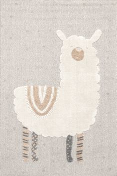 an embroidered sheep on a gray background