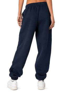 An oversized fit and handy pockets bring trendy comfort to these cotton-blend sweatpants that you'll love for your off-duty look. 50% cotton, 50% polyester Machine wash, dry flat Imported Navy Sweatpants Outfit, Navy Blue Sweatpants Outfit, Sweatpants Oversized, Trendy Sweatpants, Navy Blue Sweatpants, Navy Sweatpants, Cute Sweats, Movie Outfits, Oversized Sweatpants