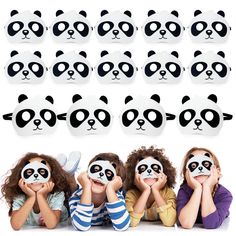 several children with panda face masks in front of their faces, all painted black and white