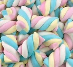 a pile of colorfully colored marshmallows sitting on top of each other