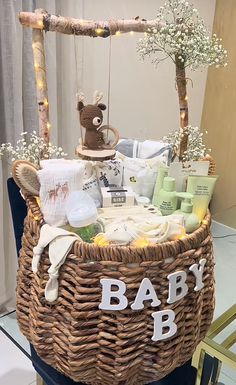 a wicker basket with baby items in it