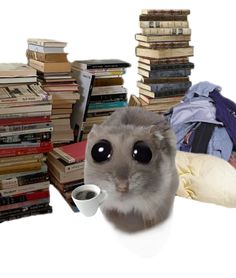 a hamster is sitting in front of a pile of books and holding a coffee cup