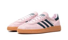 The Women’s adidas Handball Spezial “Clear Pink” is a women’s-exclusive colorway of the shoe with an 1980s-era soccer sneaker look in an eye-catching design.  The Handball Spezial in “Clear Pink” has a bright pink suede design with a tonal suede overlay on the toe and navy leather Three Stripes and “Spezial” branding on the side.  A classic “adidas Spezial” logo can be found on the tongue.  A gum rubber sole completes the look.  Release date: July 2, 2023 Daily Shoe, Spezial Shoes, Sneaker Displays, 80s Adidas, Adidas Sl 72, Adidas Handball Spezial, Sneakers Box, Adidas Handball, Kobe Shoes