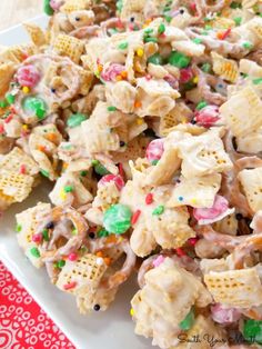 a white plate topped with cheetos cereal salad