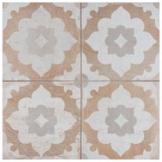 four tiles with different shapes and colors on the same tile surface, one is brown and white