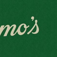 the word mo's written in white on a green background