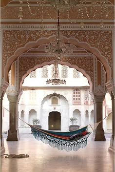 a hammock hanging in the middle of a room