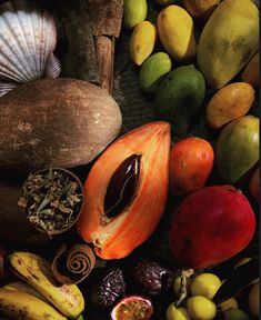 an assortment of exotic fruits and vegetables on display