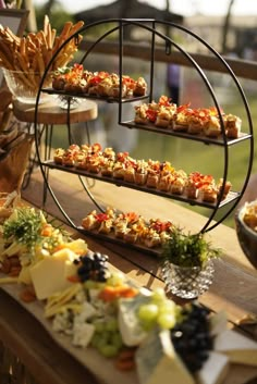 an assortment of appetizers are displayed on a table