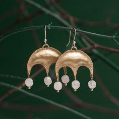 These brass arch earrings are traditional and classic, reminding of some medieval or victorian jewelry, but quite modern at the same time. They are inspired by byzantine architecture, its ornaments and details. These dangle earrings are minimalistic enough for an everyday wear with casual outfit, although you can definitely wear them for a night out.  Every pair is unique as it is not casted, but made by hands with hammer and other instruments. You can order them with different gemstones: agate, Elegant Hand Forged Brass Chandelier Earrings, Handmade Byzantine Brass Jewelry, Handmade Byzantine Style Brass Jewelry, Hand Forged Crescent Brass Earrings, Hand Forged Brass Crescent Earrings, Byzantine Brass Pierced Earrings, Byzantine Style Pierced Brass Earrings, Byzantine Style Brass Pierced Earrings, Byzantine Style Brass Earrings