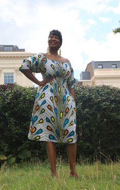 Introducing our off-shoulder Ankara dress. Elevate your style with this stunning off-shoulder Ankara dress. This elegant short white dress adorned with vibrant blue, orange, and yellow patterns is fit for any occasion. The top gracefully stretches for a comfortable and chic fit, ensuring you stand out with every step. Embrace the fusion of tradition and contemporary fashion in this uniquely crafted piece. FEATURES: Off shoulder Stretchy top Flare bottom Comfortable fit Available in different sizes We also make custom-made clothing which can be made to measure, if you provide fabrics and the style of what you would like us to produce.  We will give you an estimated dispatch and delivery time. INSTRUCTIONS Machine washable on low heat at 20 degrees  Do not bleach White Fitted Knee-length Off Shoulder Dress, White One Shoulder Midi Dress For Summer, White Off Shoulder Dress With Short Sleeves For Party, White Off Shoulder Dress With Short Sleeves, White Off Shoulder Short Sleeve Party Dress, Summer One Shoulder Knee-length Dress, White Off-shoulder Midi Dress For Summer, White Off-shoulder Midi Dress For Spring, White One-shoulder Midi Dress For Vacation