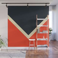 an abstract geometric wall mural in a living room