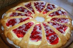 a cake that has been cut into slices and is sitting on a wooden platter