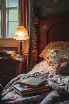 a bed room with a neatly made bed and a lamp