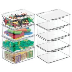 three clear storage containers filled with toys