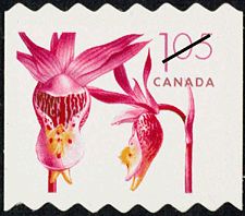 a postage stamp with an image of two pink orchids on it's side