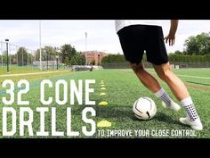 a man kicking a soccer ball on top of a green field with the words 32 cone drills to improve your close control