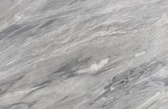 a white and grey marble textured wallpaper or flooring with an abstract design