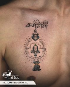 a man's chest with tattoos on it that says tattoo by savya patil