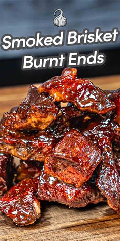 smoked brisket burnt ends on a cutting board with the words smoked brisket burnt ends