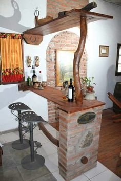 a brick bar in the middle of a room