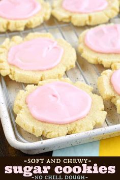 soft and chewy sugar cookies with pink icing