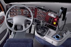 the interior of a vehicle with dashboards and steering wheel