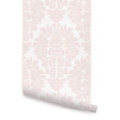 the wallpaper is pink and white with a floral design on it's side