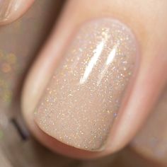 Chleo is a soft blush pink nail polish that features a gorgeously delicate holographic sparkle that is sure to steal your heart. A stunning nude that's both office appropriate and impressively holographic in the sun, Chleo is nothing short of magic on your fingertips! Fully opaque in 2-3 coats! Please be advised that this listing is for 1 (one) bottle of Chleo jelly nail polish. Any base colors used in swatches and other photographs are not included unless otherwise stated. Every 12ml bottle is Taupe Shimmer Nails, Beige Nails Sparkle, Sparkly Gel Manicure, Wedding Nails For Champagne Dress, Sand Colored Nails, Cream Glitter Nails, Cream Sparkle Nails, Sheer Pink Dip Powder Nails, Rubber Base Nail Designs