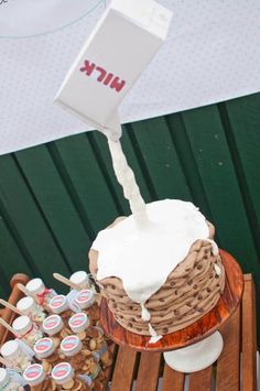 a cake sitting on top of a wooden table