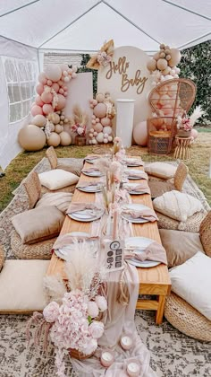 a table set up for a baby shower party