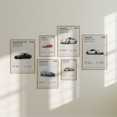 a bunch of cars are hanging on the wall