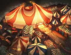 an aerial view of several circus tents at night