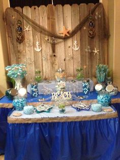 a table with blue and white decorations on it