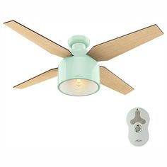 a light green ceiling fan and remote control