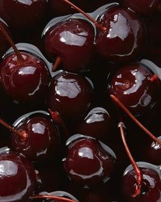 the cherries are in a bowl and ready to be eaten