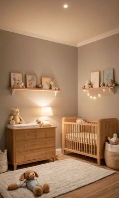 a baby's room with two cribs and a teddy bear on the rug