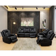 a living room filled with black leather furniture