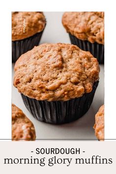 freshly baked muffins sitting on top of a white countertop with other muffins in the background