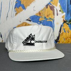 Vtg '90s Summit Constructors White On White Strapback Rope Hat One Size Fits All Leather Strapback Perfect Unused, Unworn, Deadstock Condition Standard Disclaimer: As With Any Used Or Vintage Hat, The Original Materials May Be In Lesser Condition Than A Brand New Piece. Extra Care Has Been Taken To Ensure This Purchase Is Not Only Wearable, But Enjoyable, Too. Please Be Mindful Of The Strap And Bands So That It Can Last Another Lifetime! Vintage Rope Hats, Vintage Summer Baseball Cap For Outdoor, Retro White Six-panel Trucker Hat, Vintage Adjustable Six-panel Dad Hat, 90s Style Adjustable Hats For Summer, Vintage White Dad Hat, 90s Style Adjustable Summer Hats, 90s Summer Cap, 90s Style Summer Cap