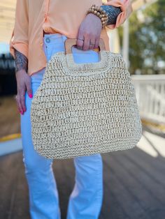 Meet our St. Tropez Straw Bag! This style is perfect for either a day at the beach or just as an accessory for your Vacay or Summer outfit. It includes a zipper closure, an interior pocket, and also a tan interior. This bag is lightweight with sturdy and durable handles, and is able to hold a lot of your necessities! *Snap the sides to create another look! Measurements: 17" L x 15" H Materials: 100% Paper Casual Top Handle Beach Bag, Summer Everyday Crochet Bag With Handles, Trendy Natural Color Hobo Bag Pouch, Chic Summer Crochet Bag With Top Carry Handle, Trendy Natural Color Hobo Bag In Pouch Shape, Casual Beach Shoulder Bag With Top Handle, Casual Top Handle Bags For Beach Season, Casual Summer Hobo Bag With Top Carry Handle, Casual Top Handle Shoulder Bag For Beach