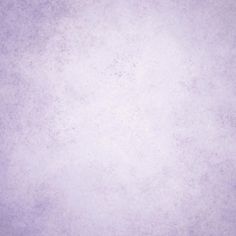 a purple background with some white spots on it